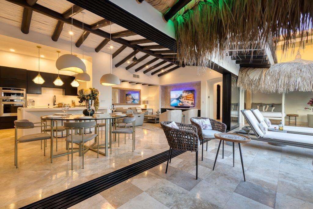 Pedregal Casa Mex-Agaves This spacious four-bedroom, four-bathroom home offers a comfortable two-story layout designed for both everyday living and entertaining. The first floor includes two bedrooms, two bathrooms, and a convenient laundry room, with direct access to a lush, private backyard—perfect for relaxing or playing outdoors.Upstairs, the open-concept kitchen features upgraded finishes, including granite countertops and extended cabinetry that provides generous storage.Additional water cistern recently added for a total of 10k liters. Accordion-style hurricane shutters included or peace of mind.Just resealed the terrace and painted downstairs bedroom in Dec '25. The main living area connects to a large outdoor terrace that runs along the back of the home, ideal for barbecues or enjoying the – 2641 Margarita Street, Cabo San Lucas, BS