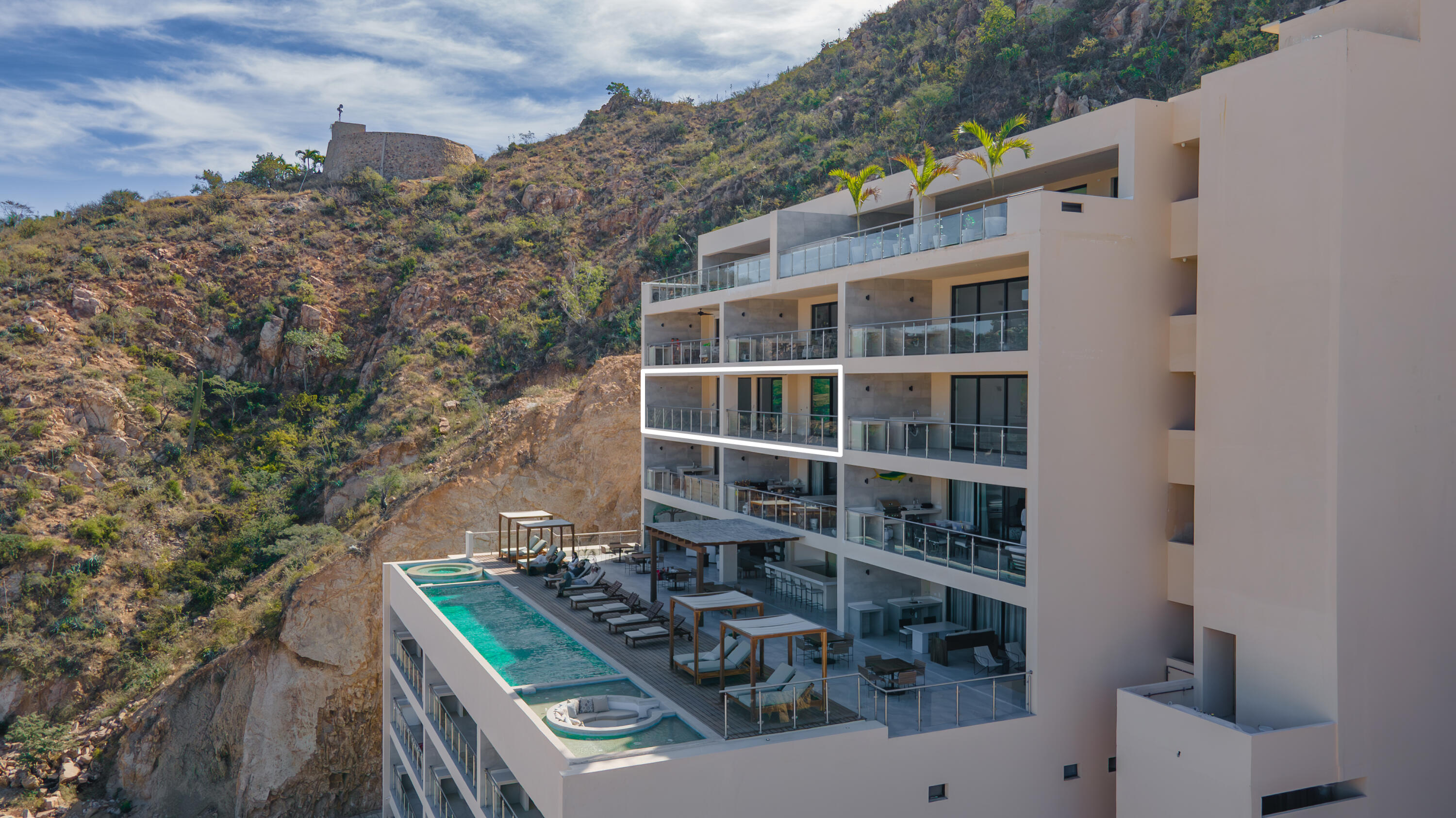 Pedregal Pedregal One Experience the pinnacle of sophisticated Cabo living in this turnkey 2-bedroom, 2-bathroom luxury condominium nestled in the legendary hillside enclave of Pedregal. Boasting modern, contemporary finishes, this premium residence features a sleek minimalist design integrated with a spacious covered terrace--making it the ultimate canvas for indoor-outdoor Baja entertainment.Breathtaking, unobstructed vistas overlooking the sparkling city lights, rugged mountain ranges, and nearby marina. Over 1,600 square feet equipped with high-end stainless steel appliances and a premium extended kitchen island.The Location has unmatched walkability. Skip the car ride and stroll straight down to world-class sportfishing charters, upscale waterfront dining, and vibrant nightlife at the Marina Cabo San Lucas.Exclusive Amenities: 24/7 controlled security, private Pacific beach access, professional tennis/pickleball clubs, a luxury health spa, an organic farmers' market, and a dedicated community water desalination plant. Includes 2 covered underground parking spaces. for sale