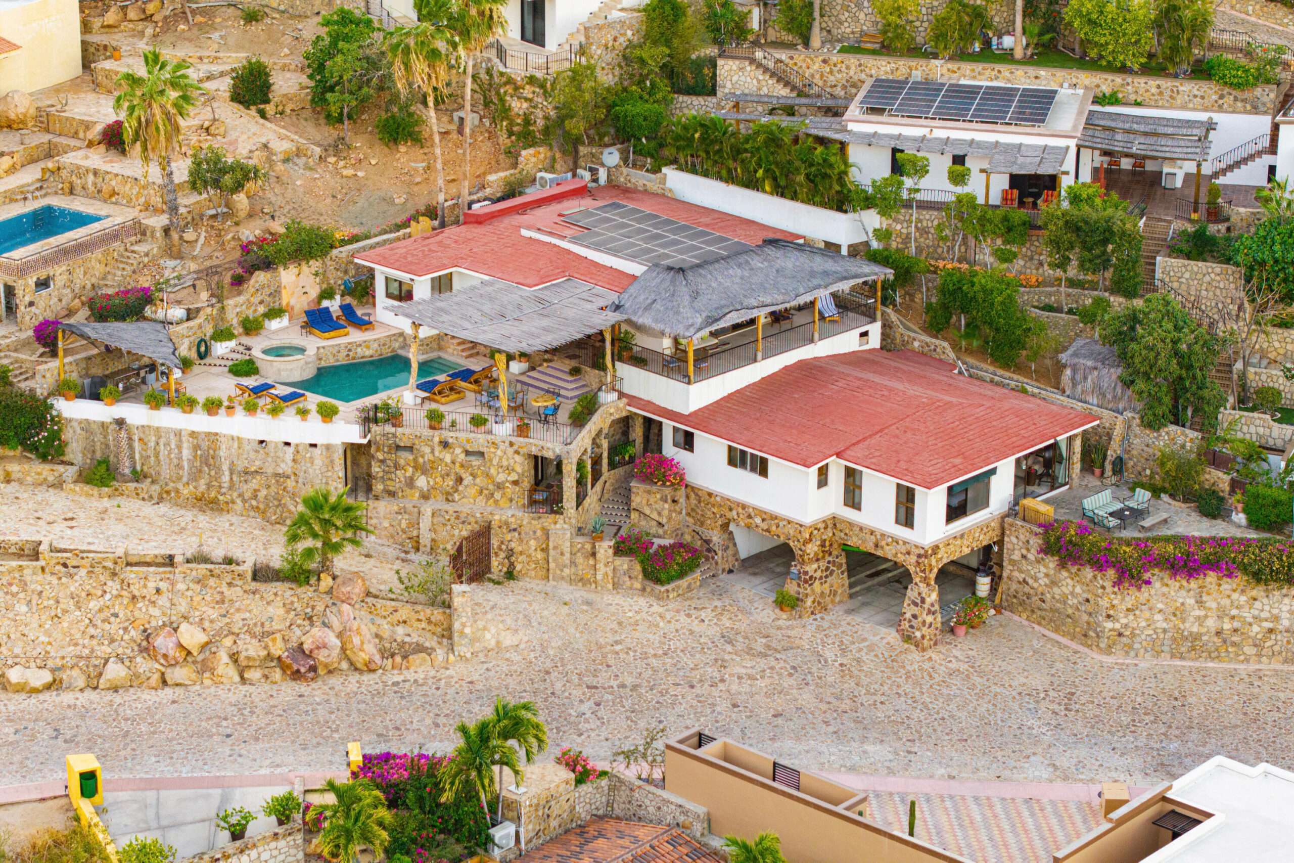 Pedregal Pedregal Csl Villa Felicidad is a 5-bedroom, 5.5-bath residence in Pedregal that combines scale, location, and proven income potential. Set just minutes from the main gate and within walking distance to the marina, it offers effortless access to Cabo's best dining and nightlife while maintaining privacy. The home features a private pool, expansive terraces, and panoramic marina for sale